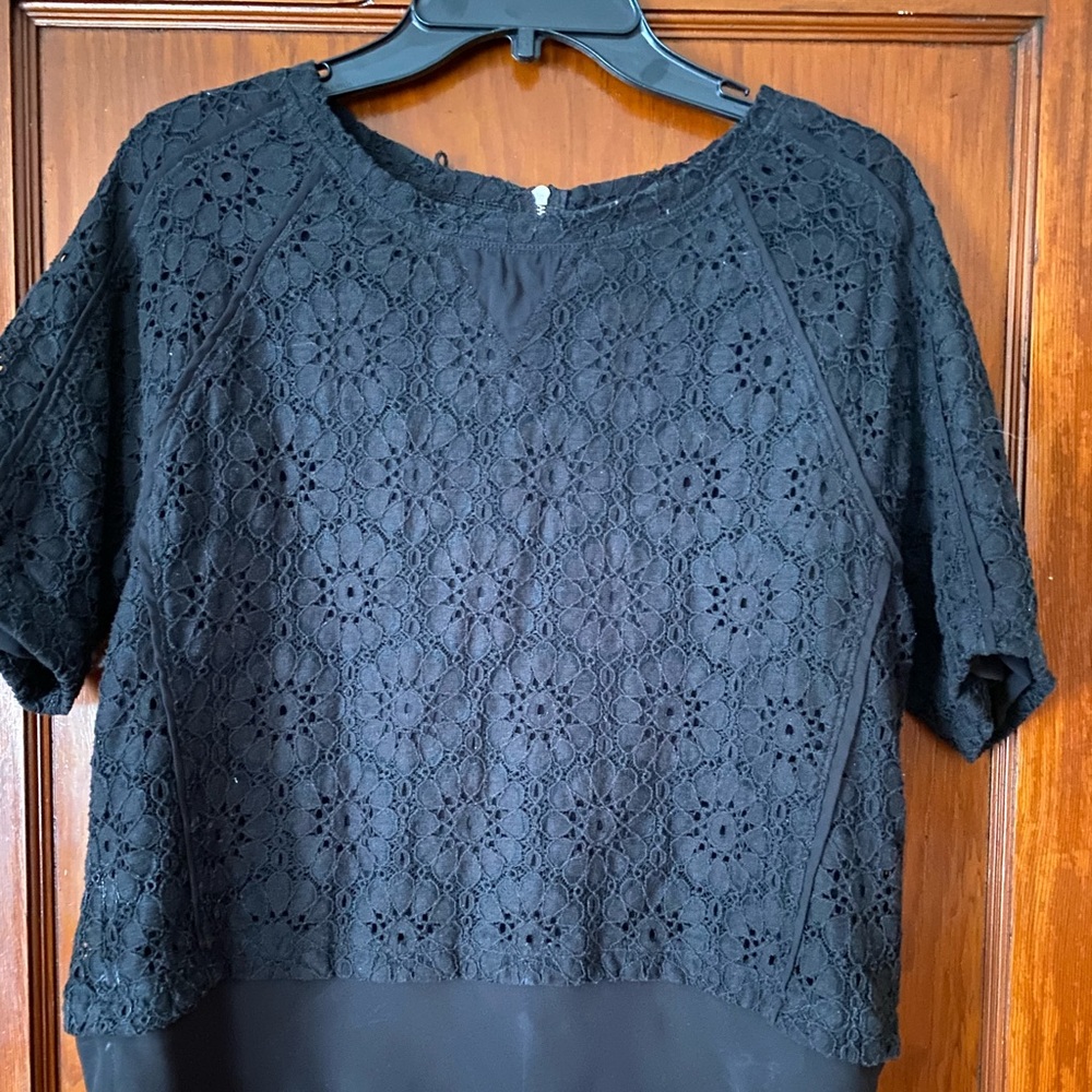 Small eyelet black top